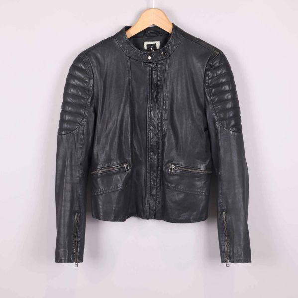 Framsida med quiltade detaljer