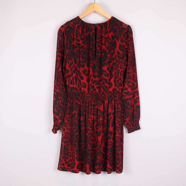 Baksida klänning mönstrad design