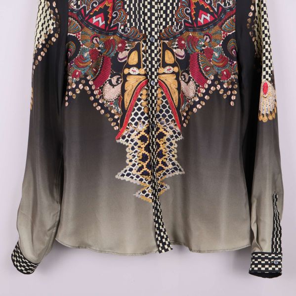 Blusens ärm med mönstrad mudd