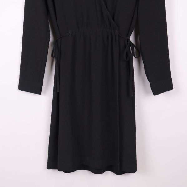 Detalj av nederdel och ärm