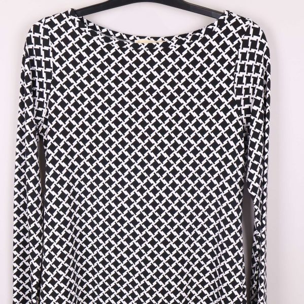 Lång ärm och mönsterdetalj