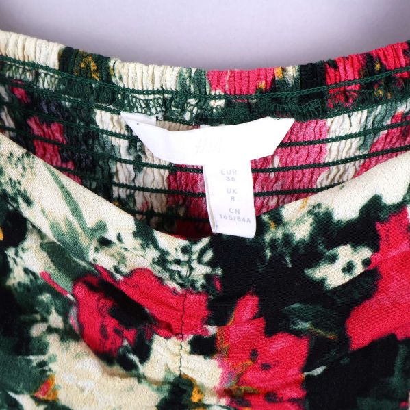 Etikett med storlek och instruktioner