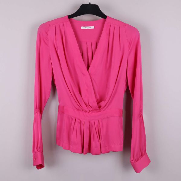 Draperad rosa blus fram