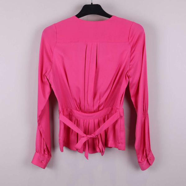 Rosa blus med knytband bak