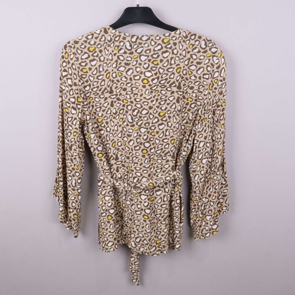 Blusens etikett och märke