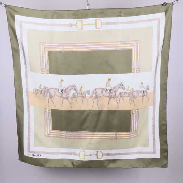 Flerfärgad scarf med ridmotiv bakifrån