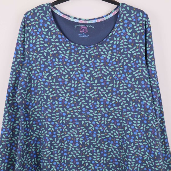 Närbild på mönstret och halsringningen på toppen