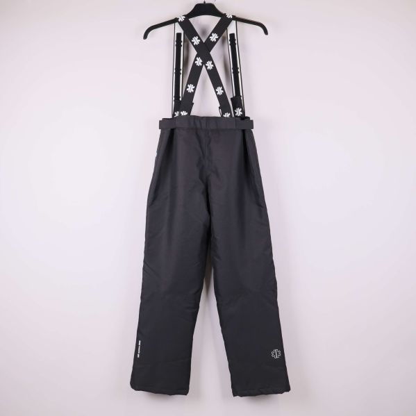 Baksidan av svarta skidbyxor med reflexdetaljer