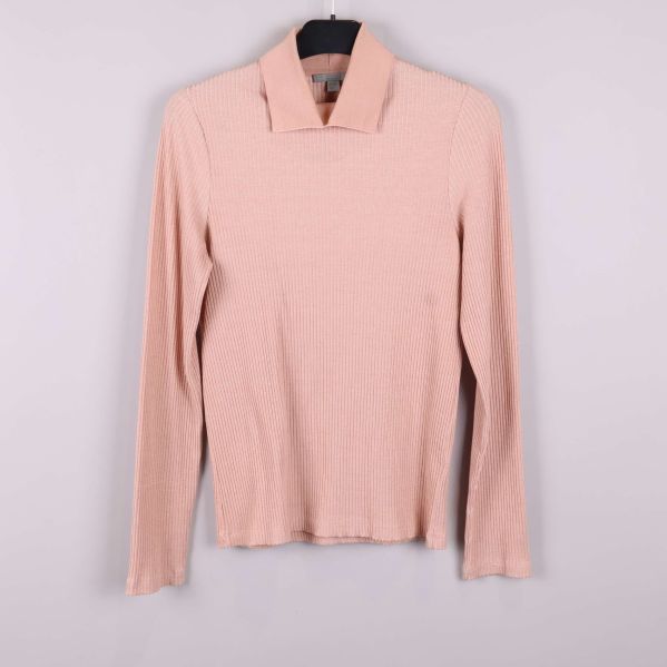 Framsidan av ribbad topp