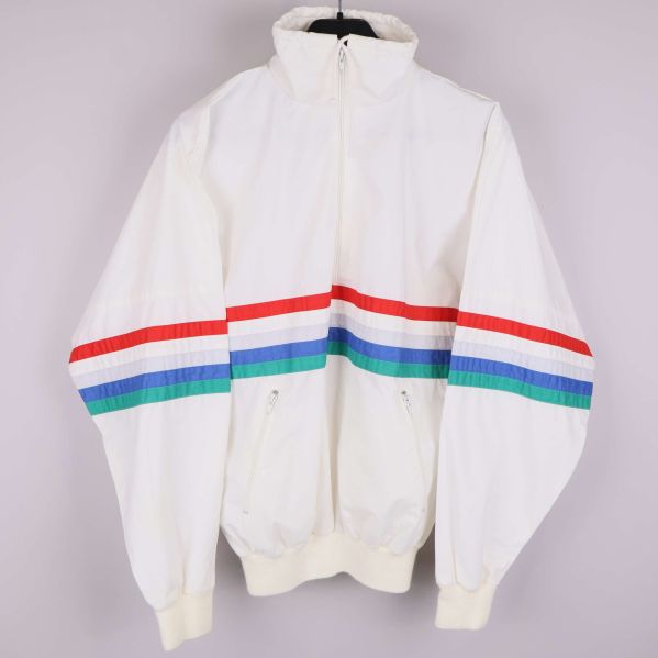 Vit retrojacka med färgglada ränder och dragkedja framtill