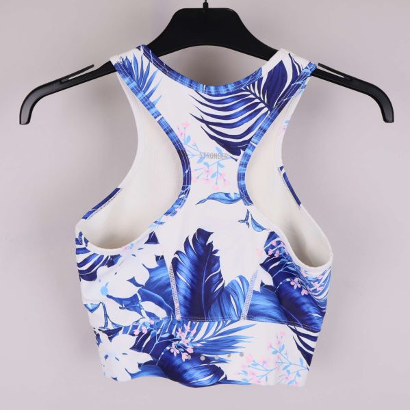Brottarrygg på sport-bh med tropiskt mönster