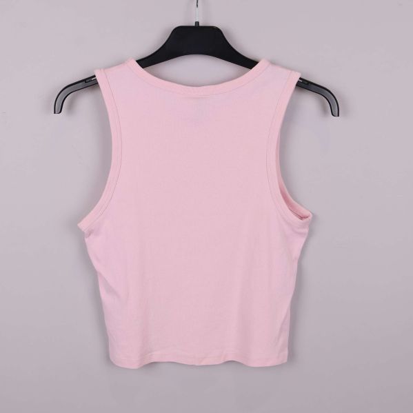 Baksidan av rosa crop top utan detaljer