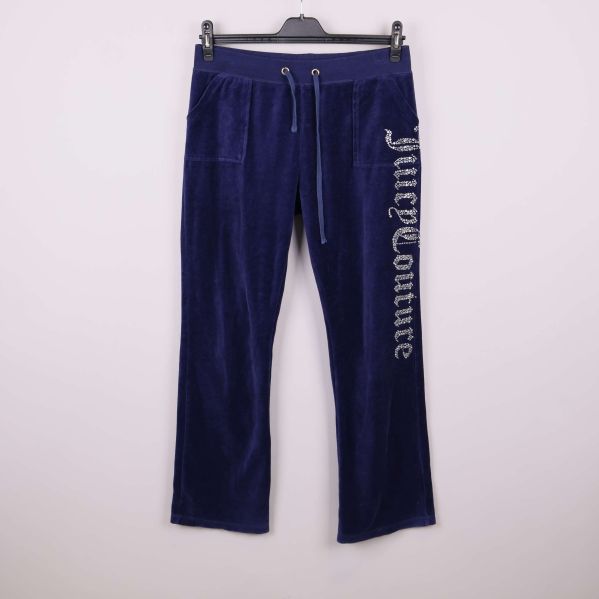 Blå velourbyxor med strasstext och fickor fram