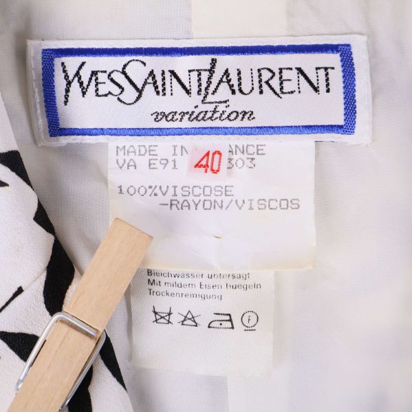 Materialetikett som visar 100% viskos och storlek 40