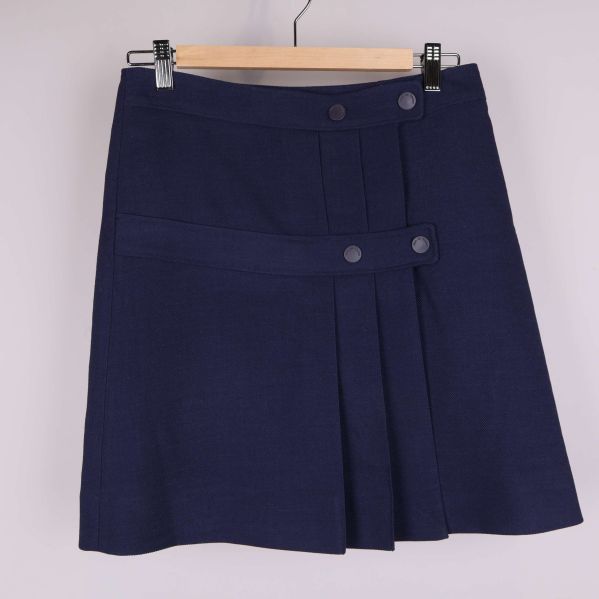 Kort mörkblå kjol med dekorknappar framtill