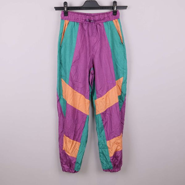 Flerfärgade retrobyxor med lila, grönt och orange mönster