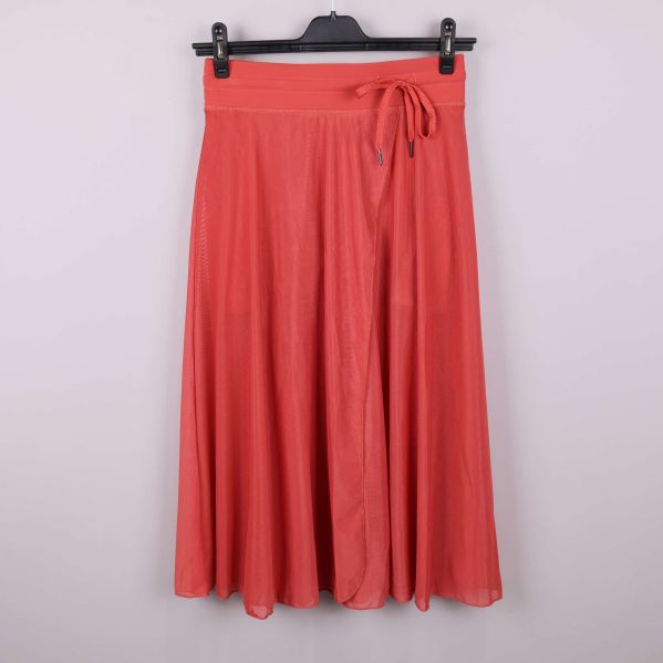 Aprikos kjol med knytband framtill i helbild