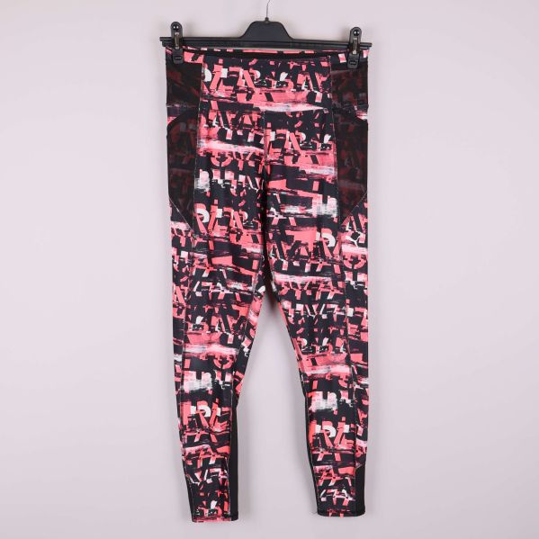 Träningstights med rosa och svart grafiskt mönster framifrån