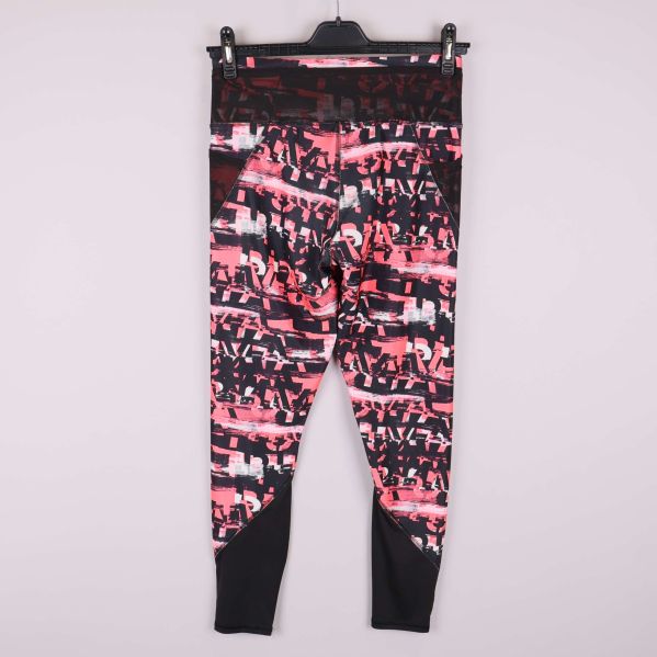 Träningstights med grafiskt mönster bakifrån och svarta benpaneler