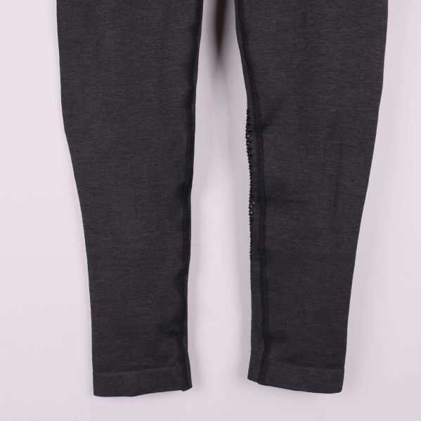 Nedre delen av benen på träningstights