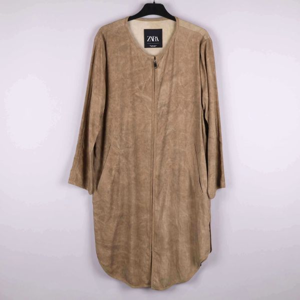 Beige kappa framsida