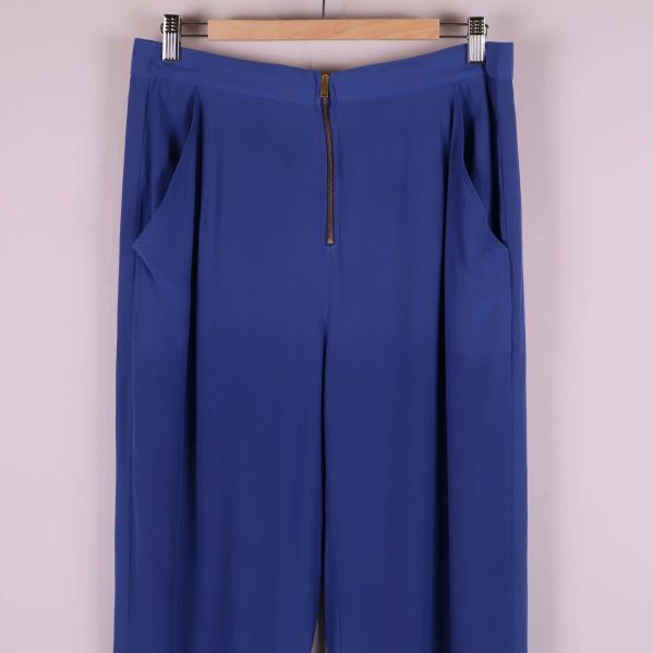 Övre del av byxa med fickor och dragkedja fram