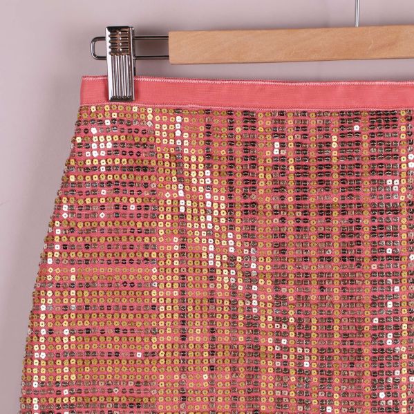 Övre del av kjol med paljetter och linning