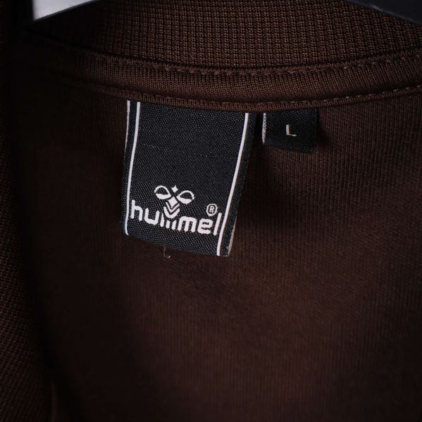 Storleksetikett med hummel-logo och storlek L