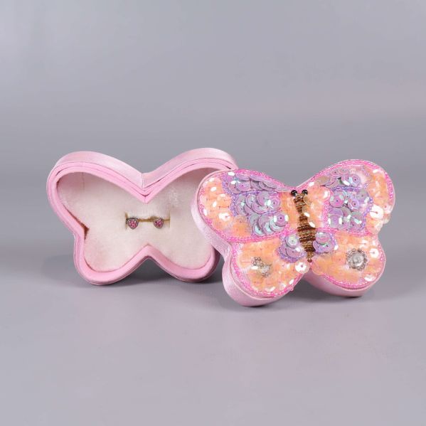 Fjärilsformad ask i rosa med glittrande paljetter och örhängen inuti