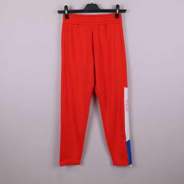 Röda sportbyxor med färgblock på vänster ben
