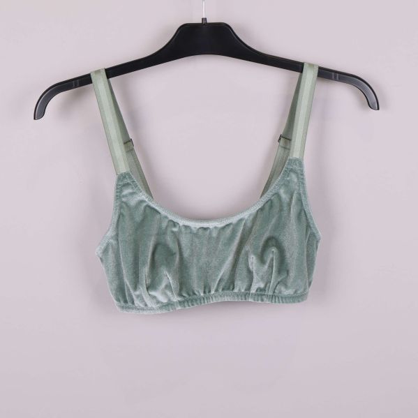 Ljusgrön velour-bh med breda axelband på galge