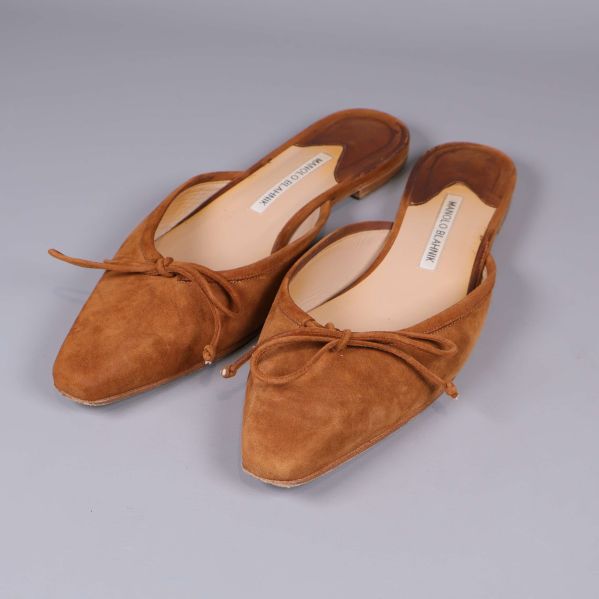 Bruna slip-in skor i mocka med rosett framtill