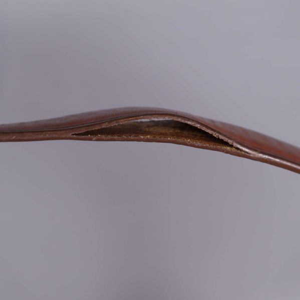 Släppt i söm på rem