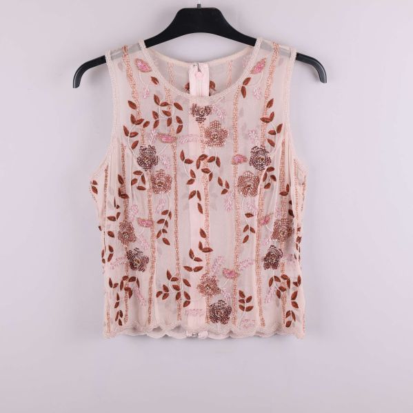 Ärmlös topp med broderade blommor och paljetter framtill