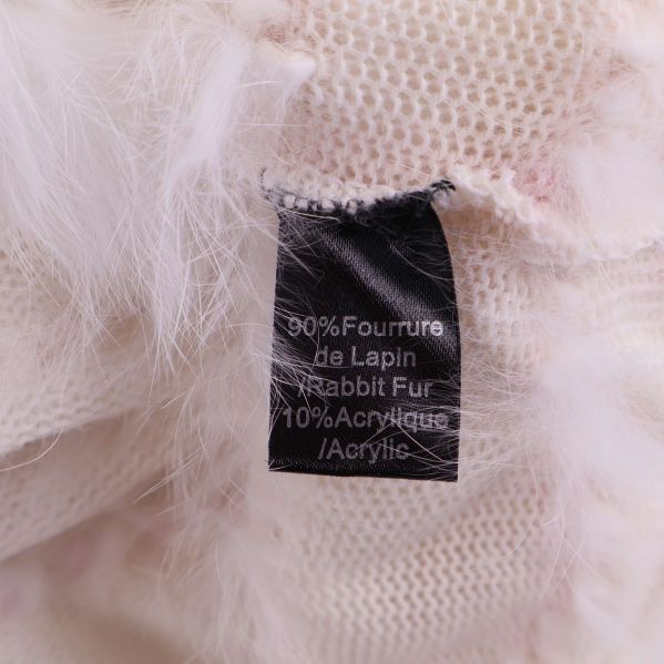 Materiallapp med text 90% rabbit fur, 10% acrylic