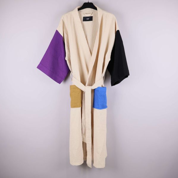 Badrock med våfflad struktur och färgade fickor och ärmar