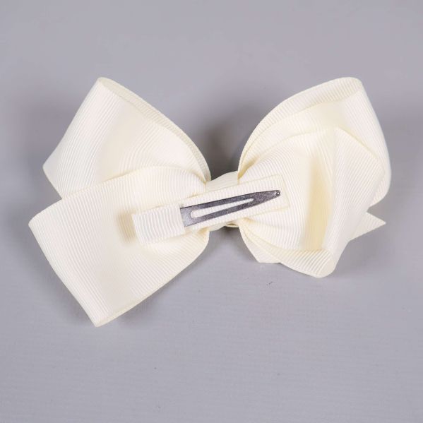 Hårrosett med metallklämma synlig på baksidan