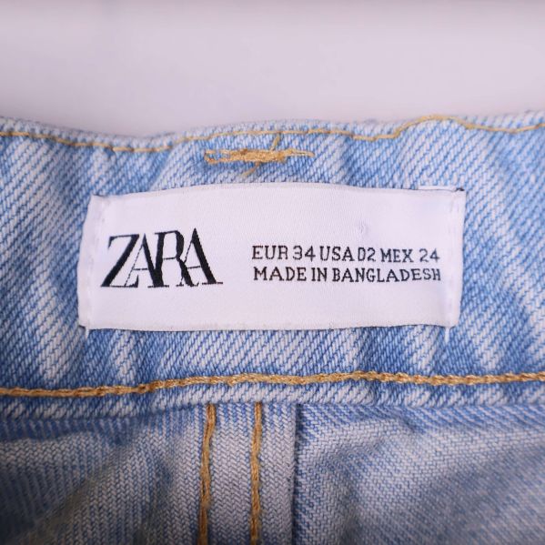 Närbild på Zara-etikett och storleksangivelser