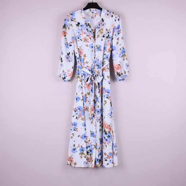 Blommig midiklänning upphängd med knytskärp och långa ärmar