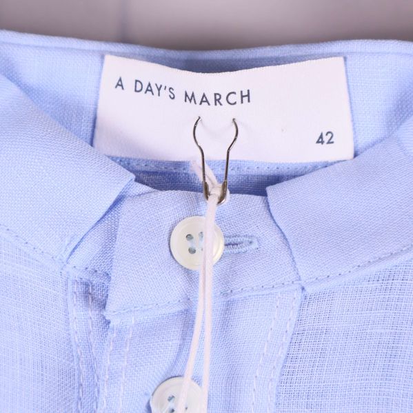 Halsringning och märkesskylt med storlek 42