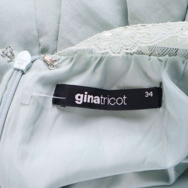 Storleks- och varumärkestagg från Gina Tricot, storlek 34