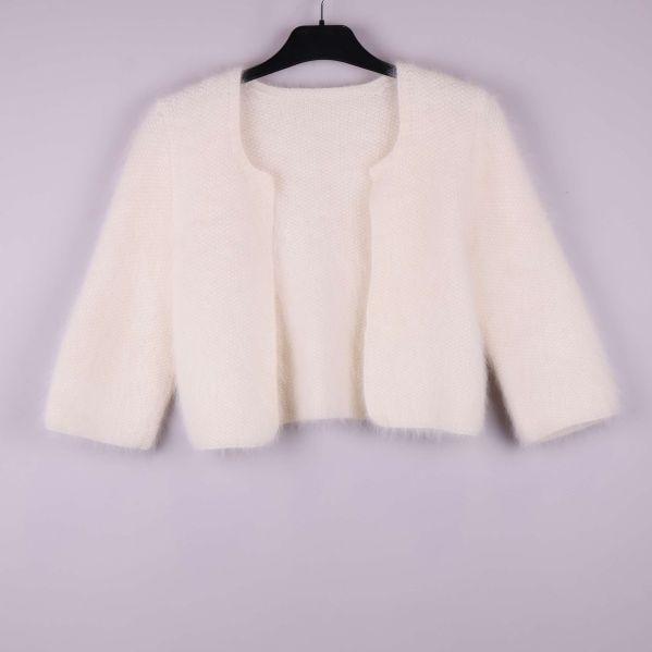 Kort vit kofta med öppen front framifrån