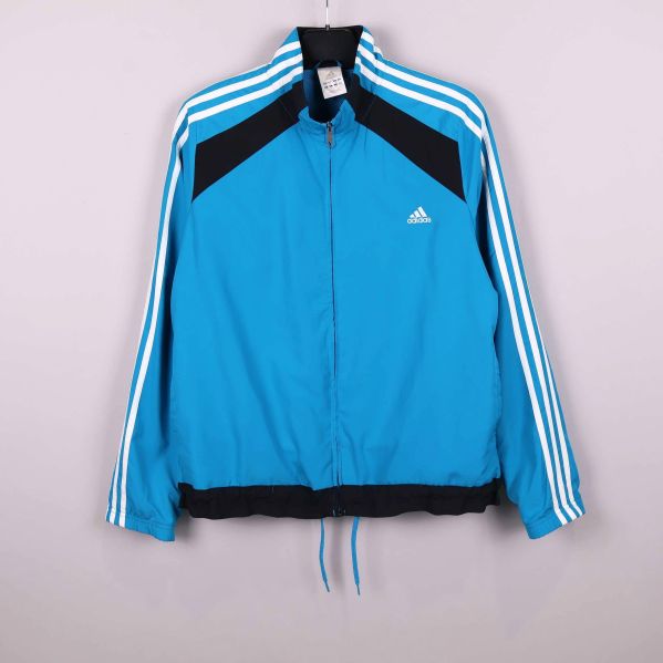 Blå Adidas sportjacka med tre vita ränder på ärmarna