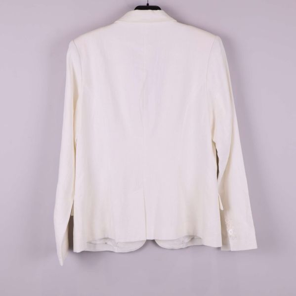 Vit kavaj bakifrån med slätt tyg och sprund