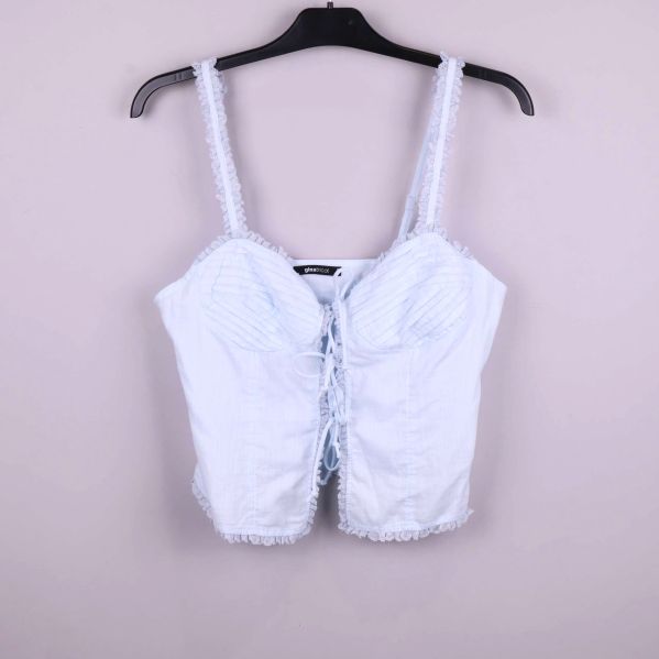 Ljust blått bustierlinne med spetskant och snörning