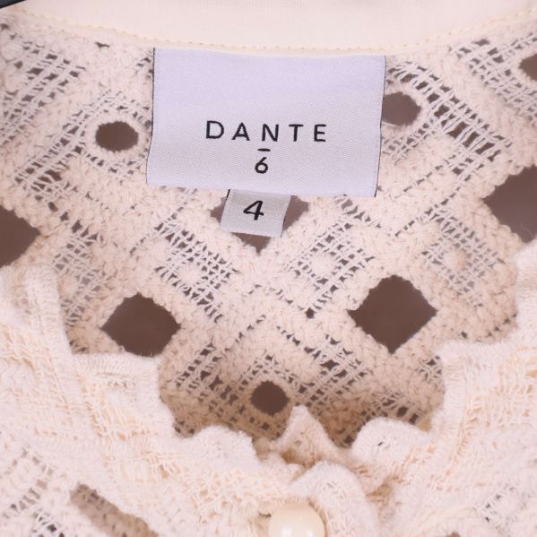 Närbild på varumärkesetikett Dante och storlek 34