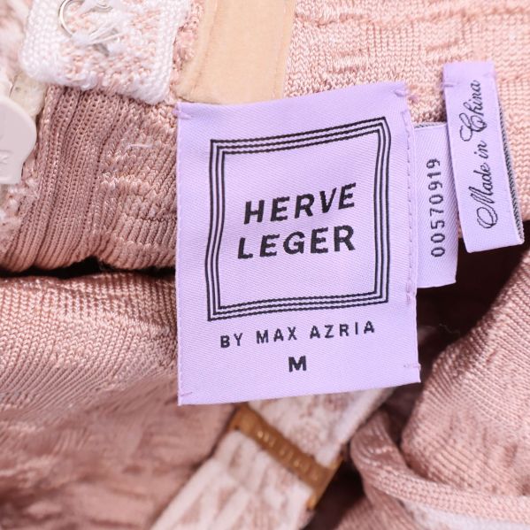 Herve Leger etikett med storlek M i lila