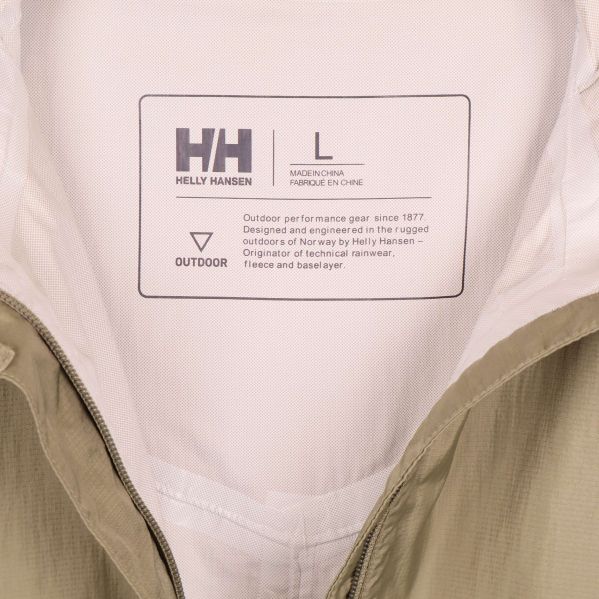 Storleks- och varumärkesetikett Helly Hansen inuti jackan
