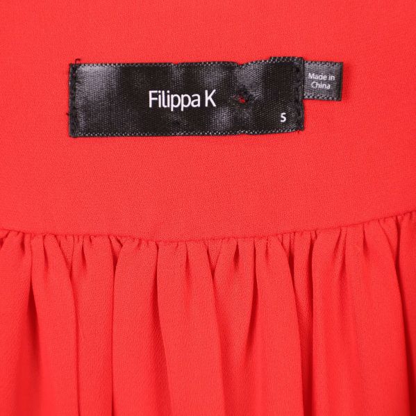 Filippa K svart etikett och storleksmärkning S