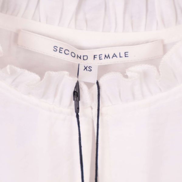Etikett från Second Female och storlek XS